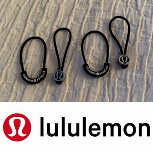 Lululemon hair tie and zipper pulls